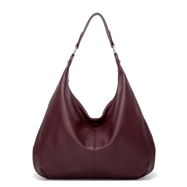 A soft and spacious Sabrina Women's Hobo Bag with a casual, slouchy design and a single shoulder strap. This versatile shoulder bag offers ample space for essentials, making it an ideal accessory for everyday use or casual outings.