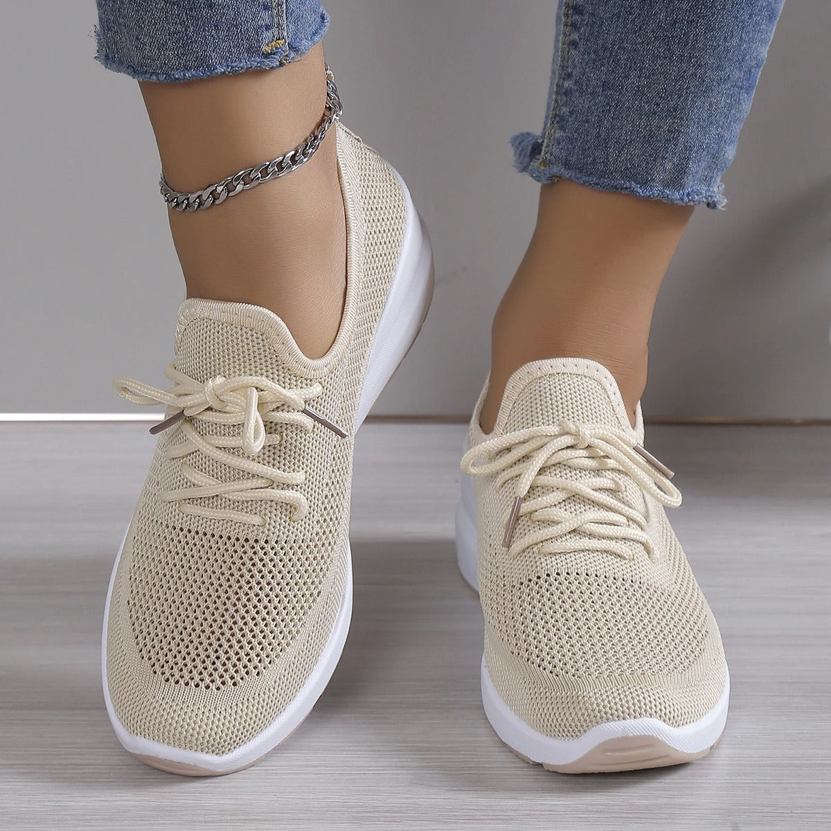 Close-up of a stylish and breathable women's lightweight shoe with a comfortable fit, perfect for casual wear and daily activities.