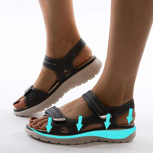Image showing women's comfortable sandals with a supportive design, featuring adjustable straps and a durable sole, perfect for casual wear and all-day comfort.