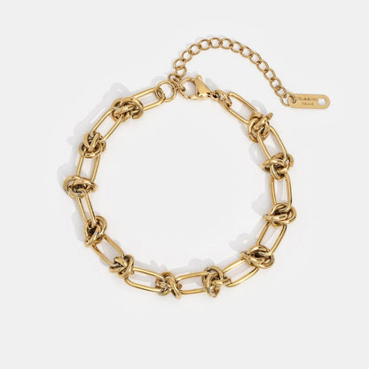 Close-up of the Sophia Women's Knot Bracelet showcasing its bold design with intricate knot details, perfect for making a statement and enhancing any outfit with a touch of sophistication.